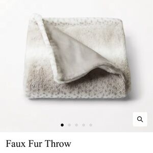 Indigo throw (cream). Brand new. All wrapped and never used.